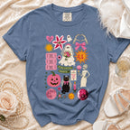 Blue t-shirt with Halloween wedding graphic: bride ghost, cat, pumpkin, skeleton, and spooky text.