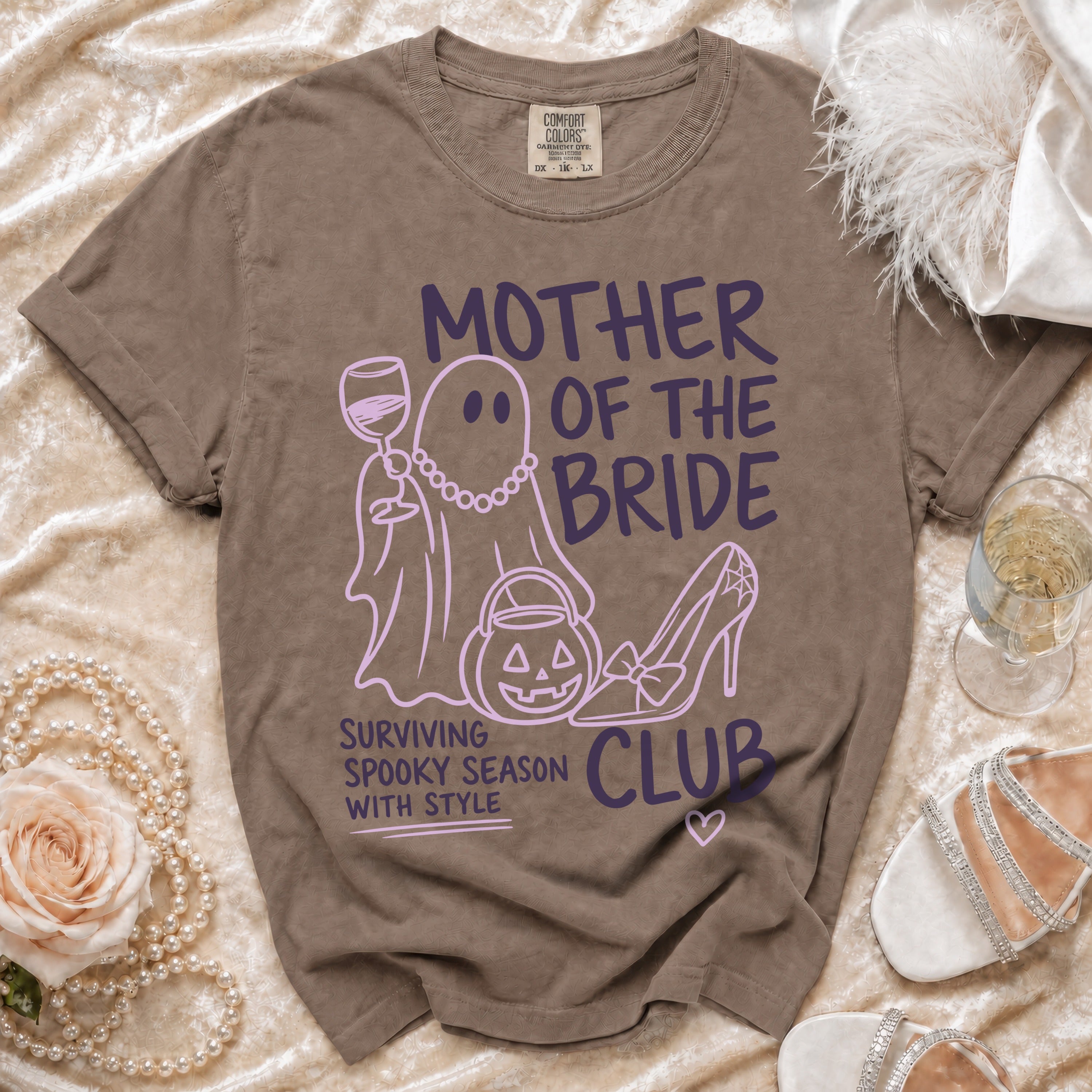 "Mother of the Bride" shirt with ghost, pumpkin, and high heel graphics.