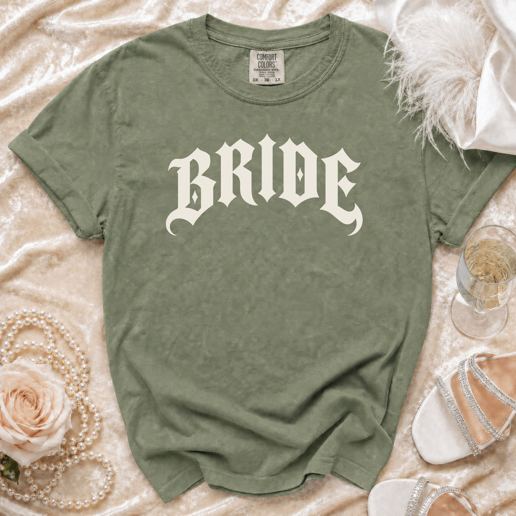Green t-shirt with "BRIDE" in gothic font and Comfort Colors tag.