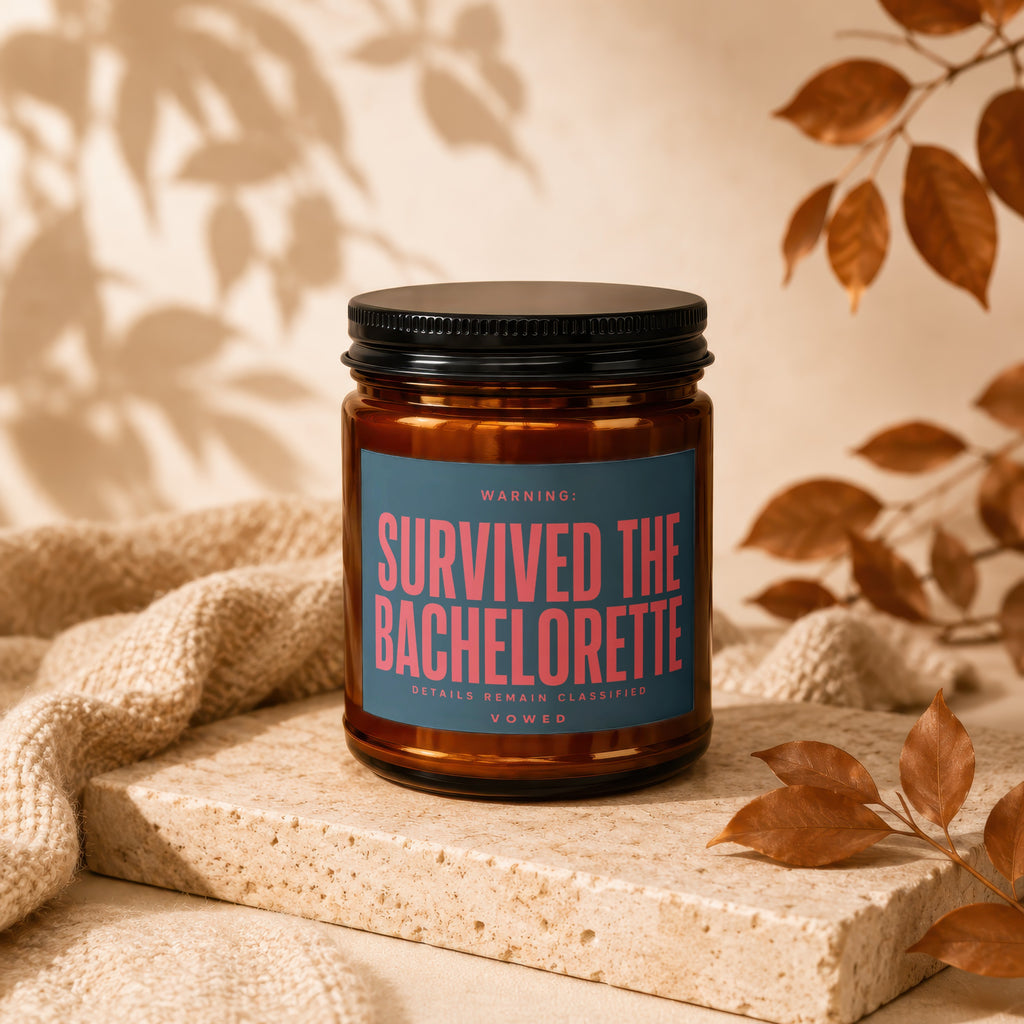 Candle labeled "Survived the Bachelorette. Details Remain Classified. VOWED."