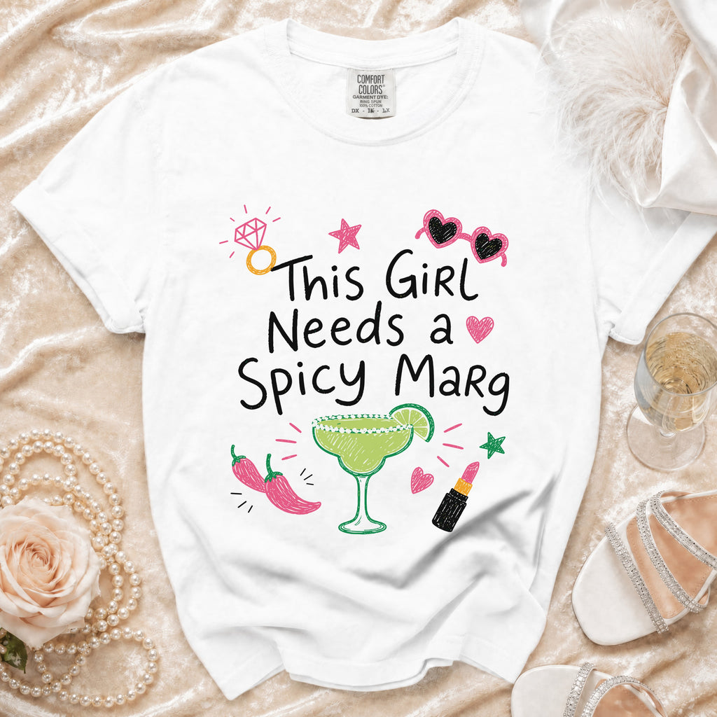 White t-shirt with "This Girl Needs a Spicy Marg" graphic and margarita.