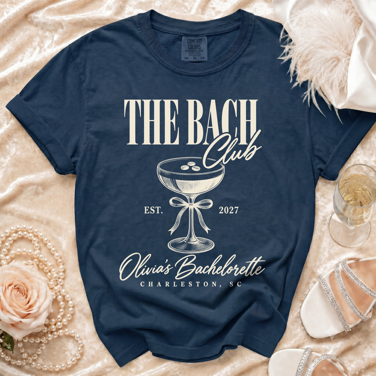 Navy t-shirt with "The Bach Club" design and "Olivia's Bachelorette Charleston, SC".