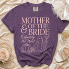 Purple t-shirt with "Mother of the Bride Definitely the Treat" text and ghost design.