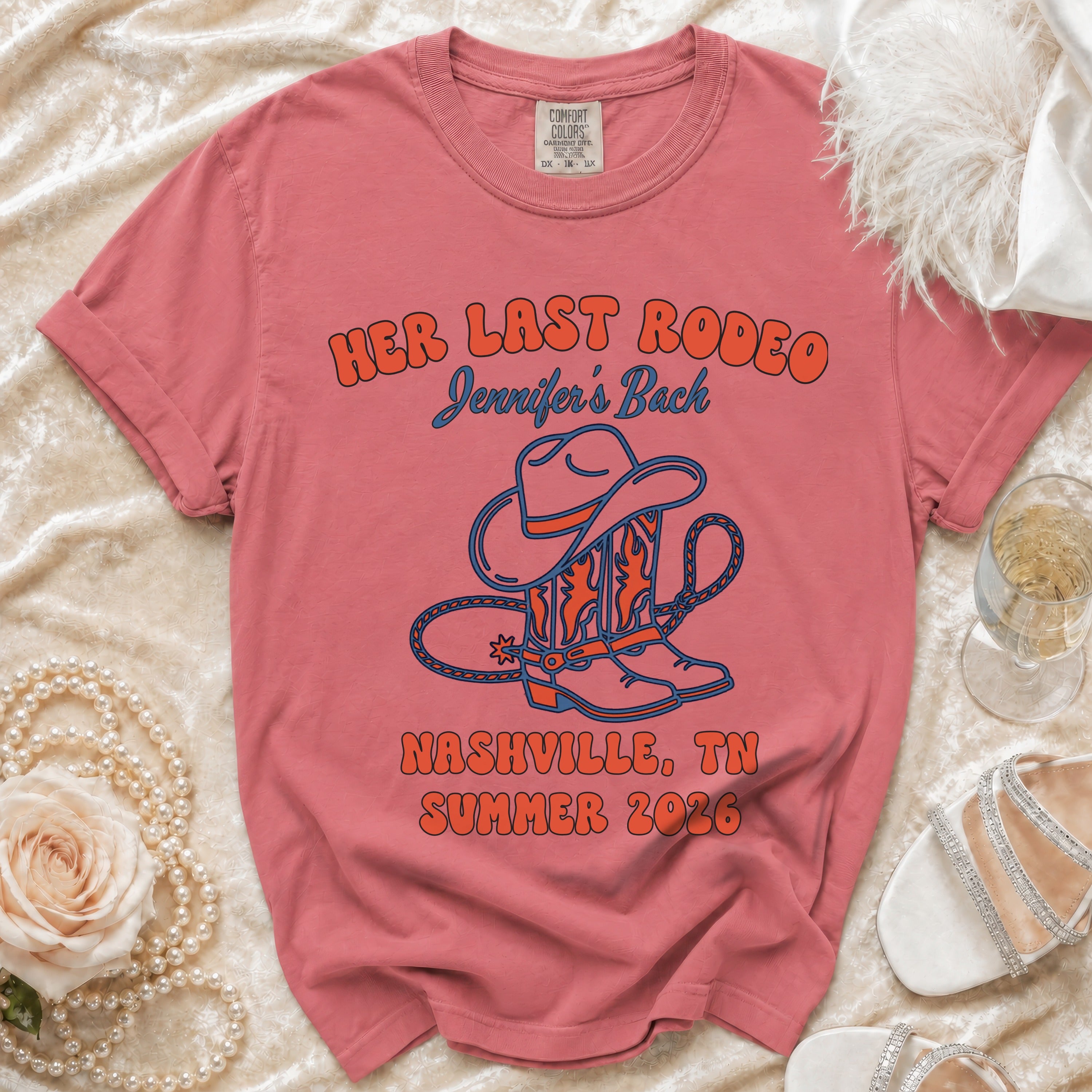 Coral t-shirt with "Her Last Rodeo Jennifer's Back Nashville, TN Summer 2026" and cowboy boots.