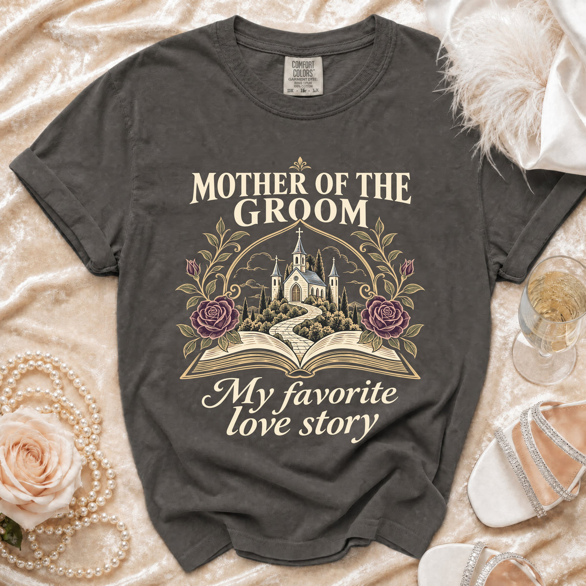 "Mother of the Groom, My Favorite Love Story" graphic tee with church and open book design.
