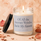 Glass candle with lit wick and label saying "Of All the Internet Weirdos, You're My Favorite."