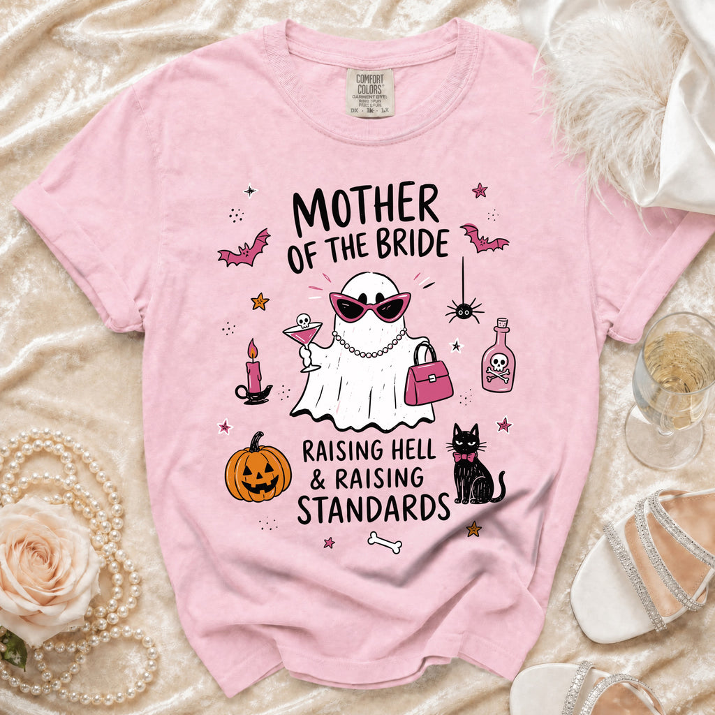 Pink t-shirt with "Mother of the Bride" text and spooky-themed graphics.