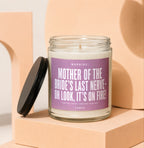 Candle with "Mother of the Bride's Last Nerve" text and black lid.