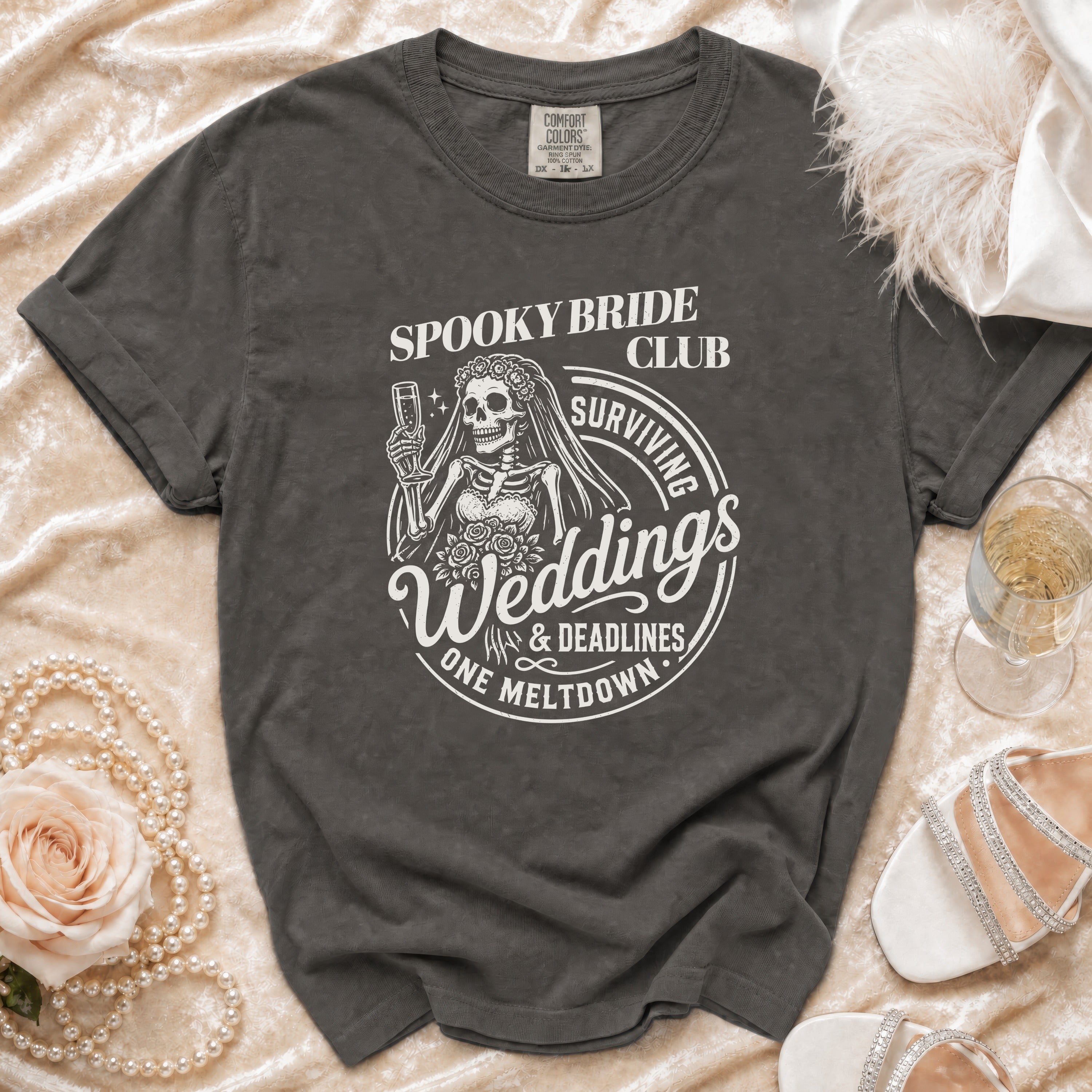 Charcoal t-shirt with "Spooky Bride Club Surviving Weddings & Deadlines" graphic.