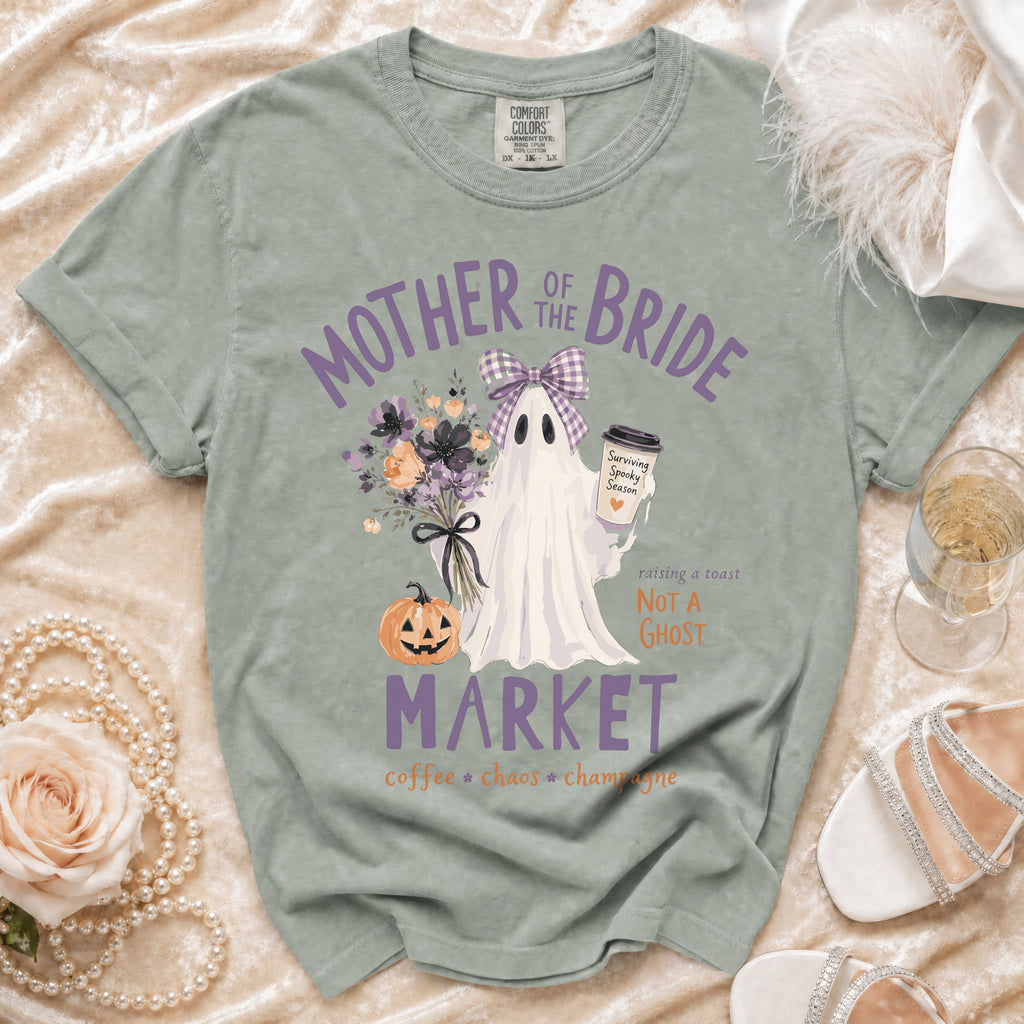 Ghost graphic t-shirt reading "Mother of the Bride MARKET coffee chaos champagne".