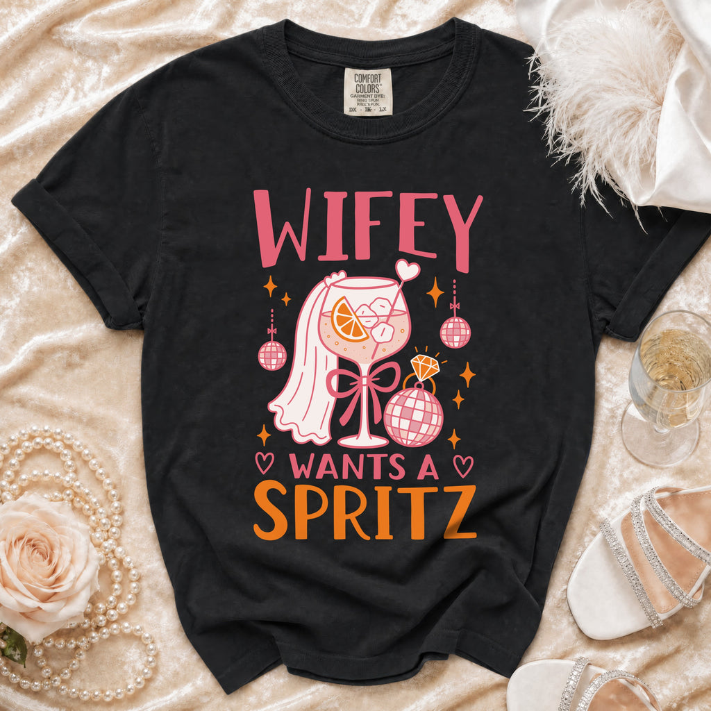 Black t-shirt with "Wifey Wants a Spritz" graphic featuring a cocktail glass.