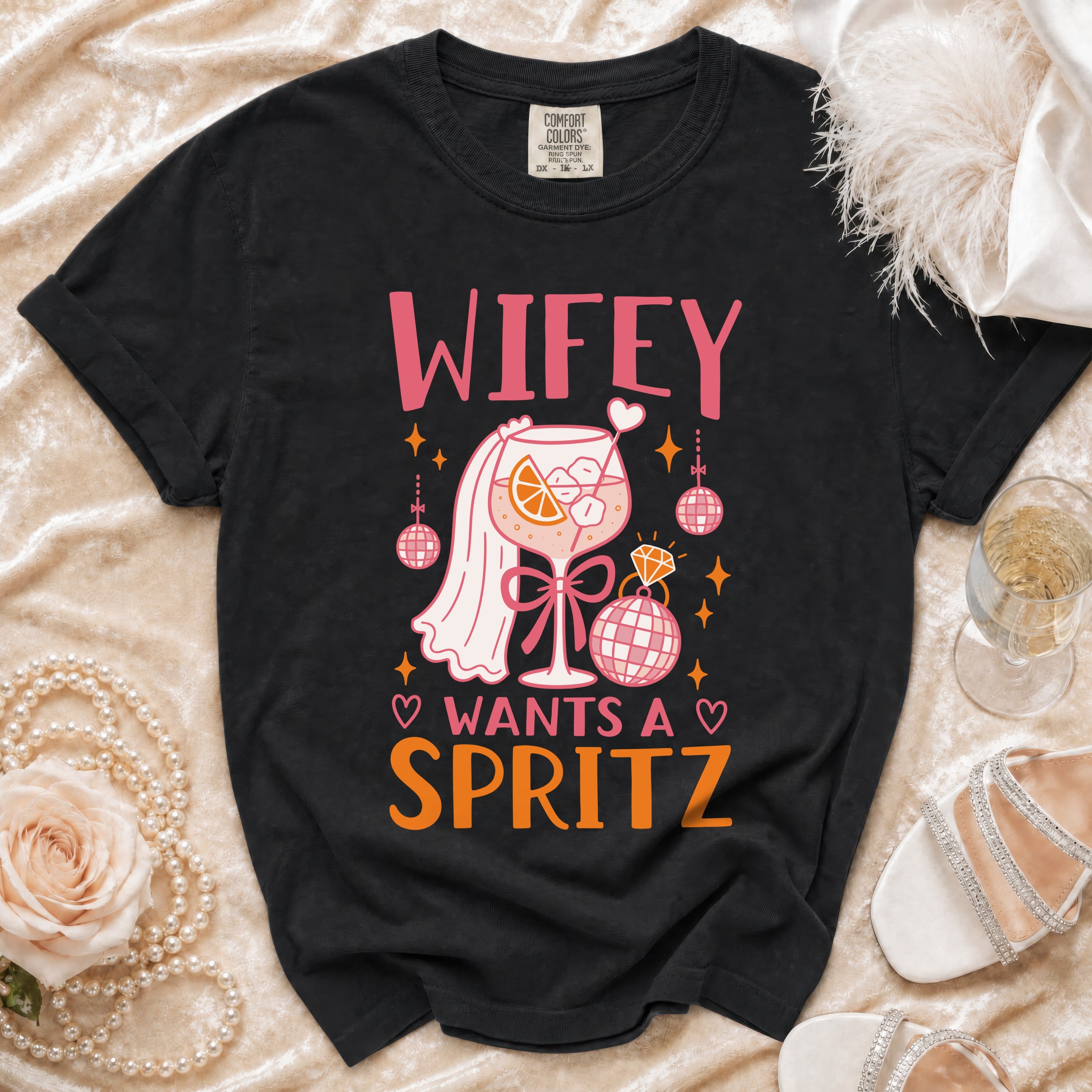 Black t-shirt with "Wifey Wants a Spritz" graphic featuring a cocktail glass.