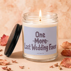 Lit candle in glass jar with lid next to it reads "One More Last Wedding Favor VOWED".