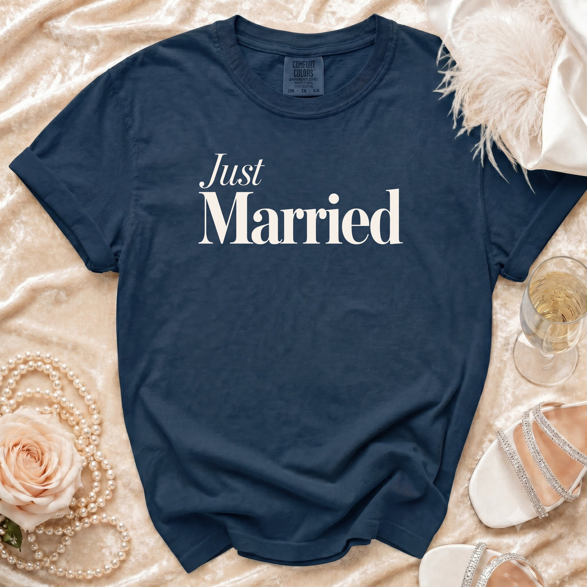 Navy t-shirt with "Just Married" printed in white text.