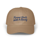 Tan dad hat featuring dark blue cursive embroidery reading "Forever Starts With A Howdy" on the front.