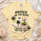 Yellow t-shirt with ghost, bouquet, books, and "Mother of the Bride I Raised Her Not The Boo" text.