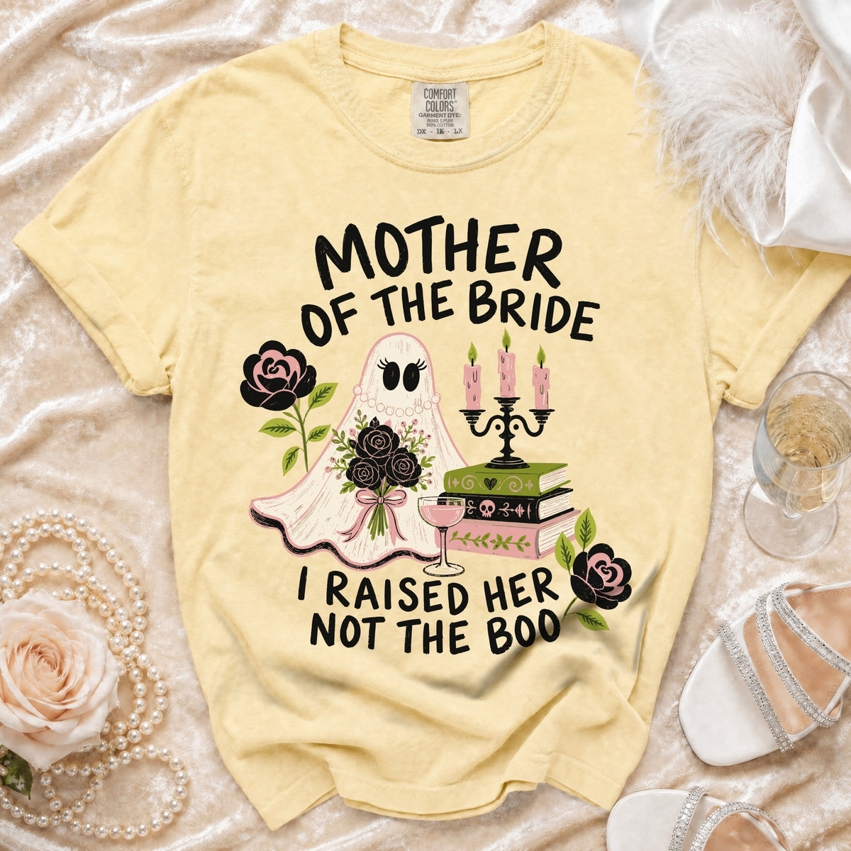 Yellow t-shirt with ghost, bouquet, books, and "Mother of the Bride I Raised Her Not The Boo" text.