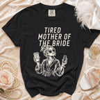 Black t-shirt with "Tired Mother of the Bride" graphic and coffee cup and champagne.