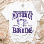 White t-shirt with purple text reading "Proud Member of the Mother of Bride Est. 2026 #Boojeé".