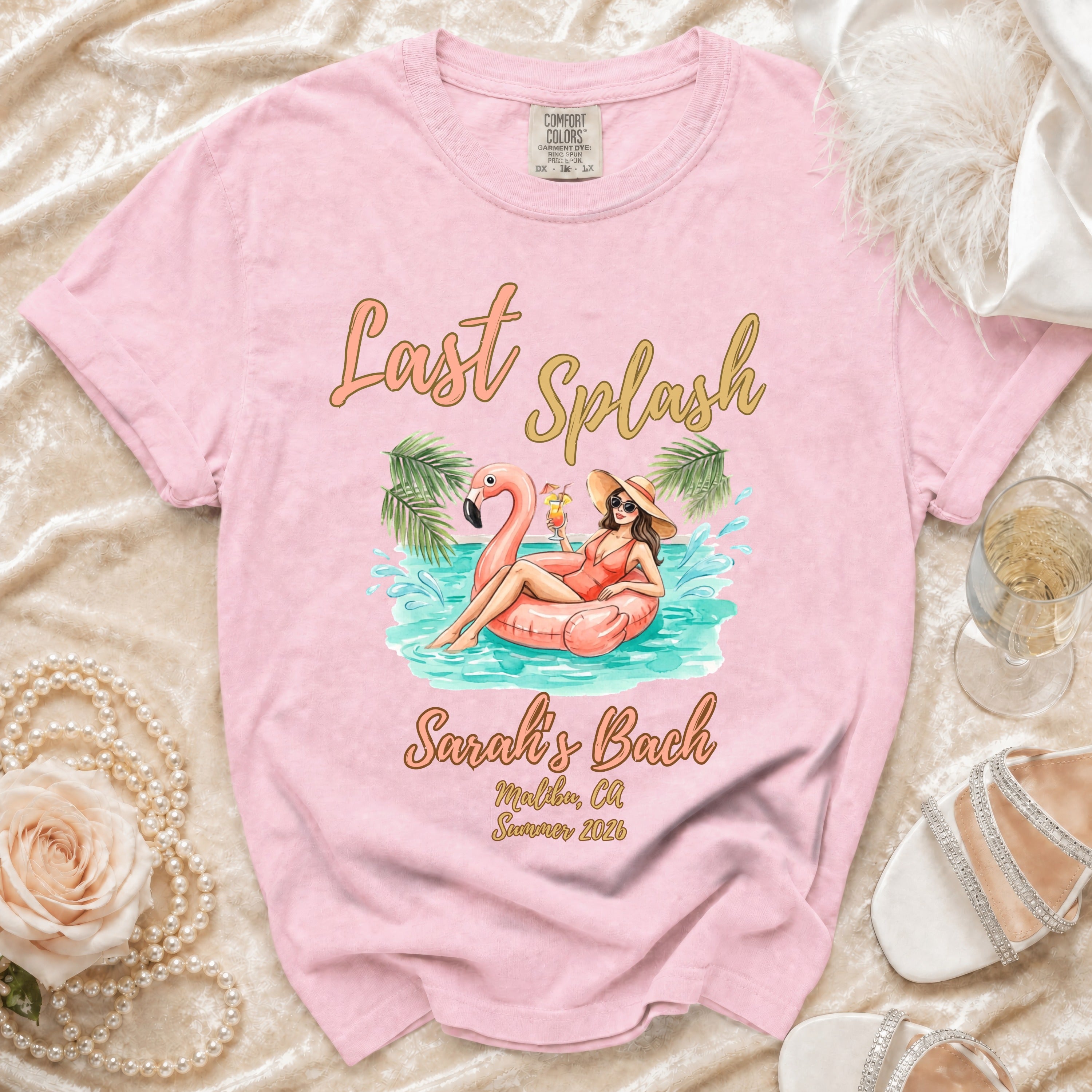 Pink t-shirt with "Last Splash Sarah's Bach Malibu, CA Summer 2026" and flamingo graphic.