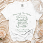White t-shirt with "Fresh Off The Market" and "emily's bachelorette Austin, TX" text.