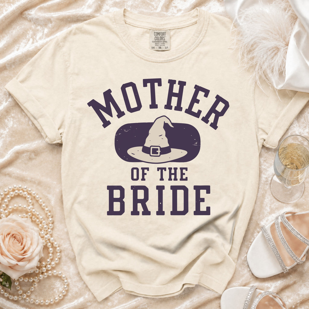 T-shirt with "Mother of the Bride" text and witch hat graphic.