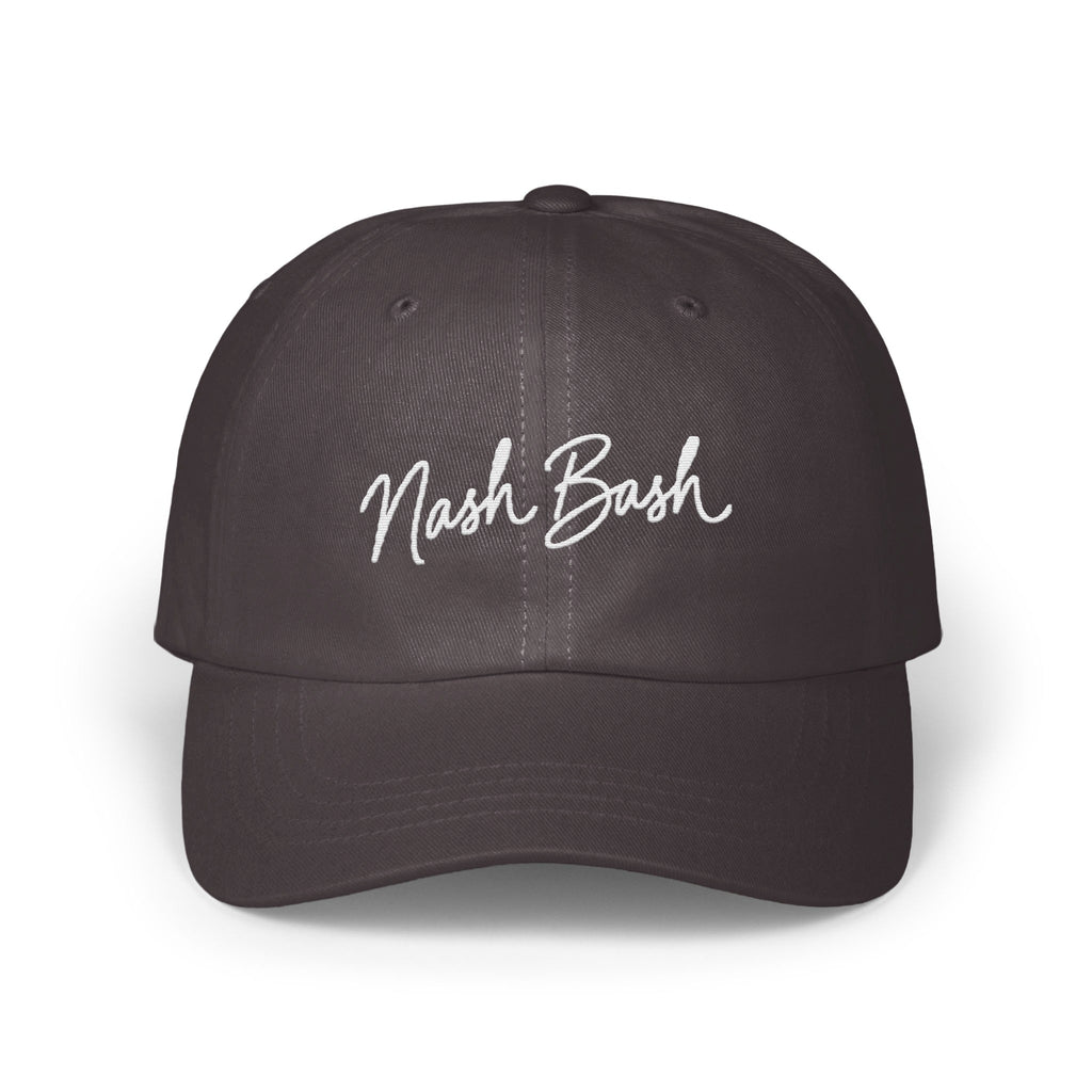 Dark grey dad hat with white embroidered script reading Nash Bash centered on the front panels.