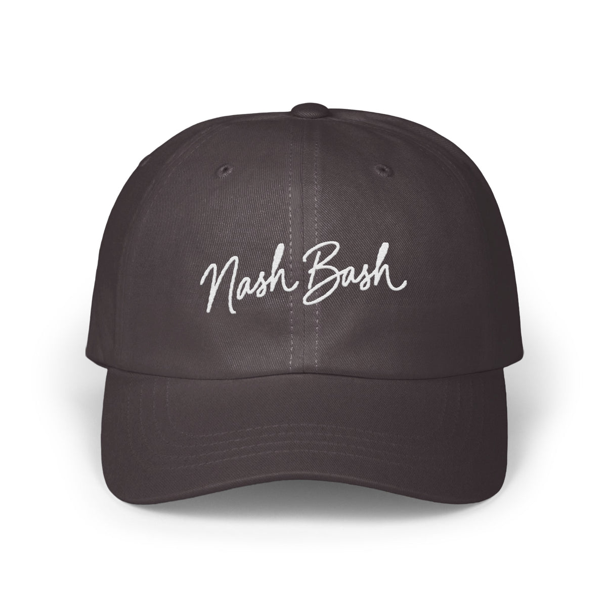 Dark grey dad hat with white embroidered script reading Nash Bash centered on the front panels.