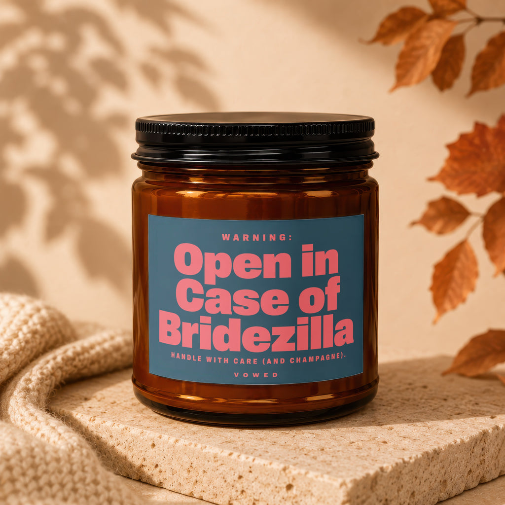A candle in a brown jar with a label reading "Open in Case of Bridezilla."