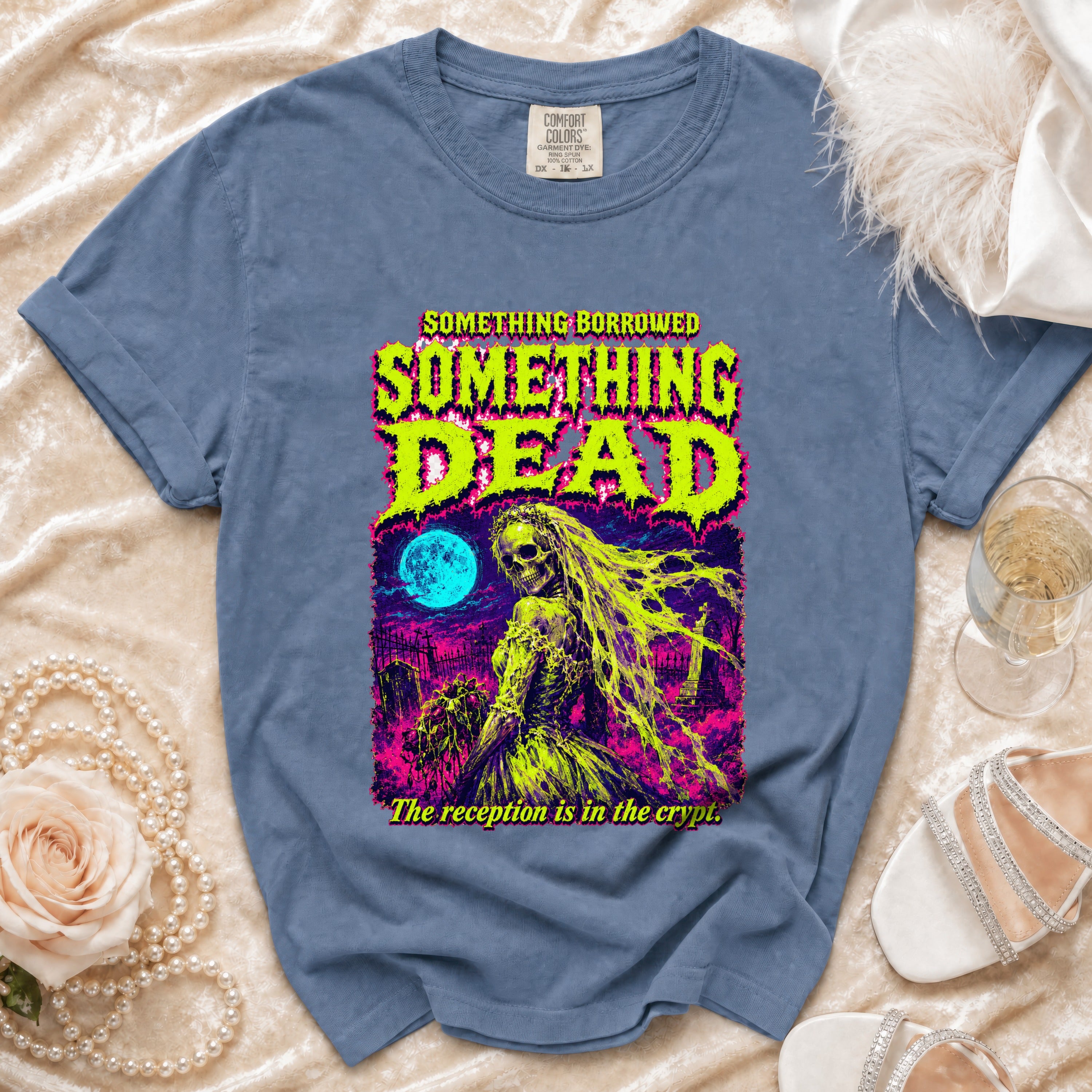 Blue t-shirt with skeleton bride graphic and "Something Dead" text.
