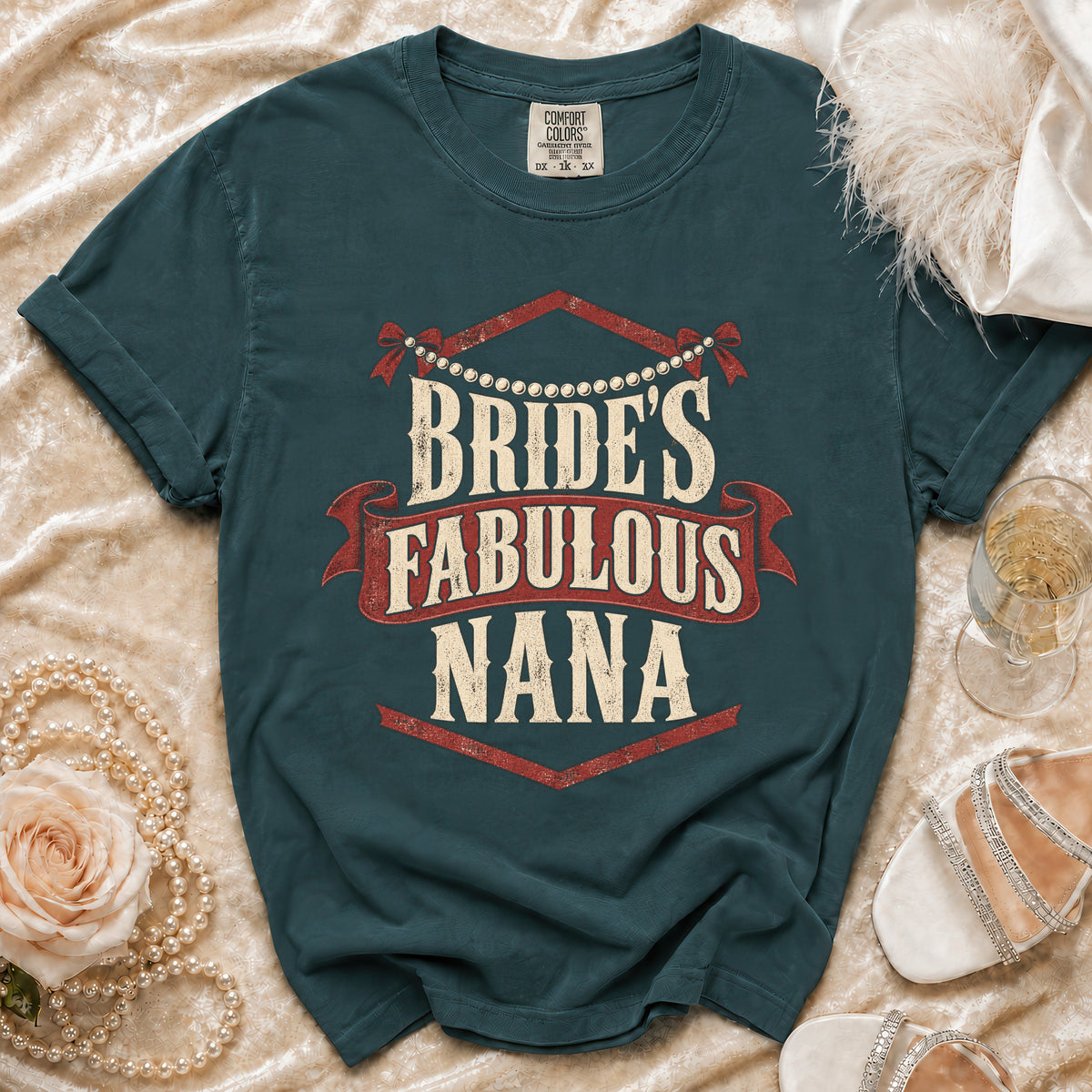Teal t-shirt with "Bride's Fabulous Nana" text, decorative pearls, and bows.
