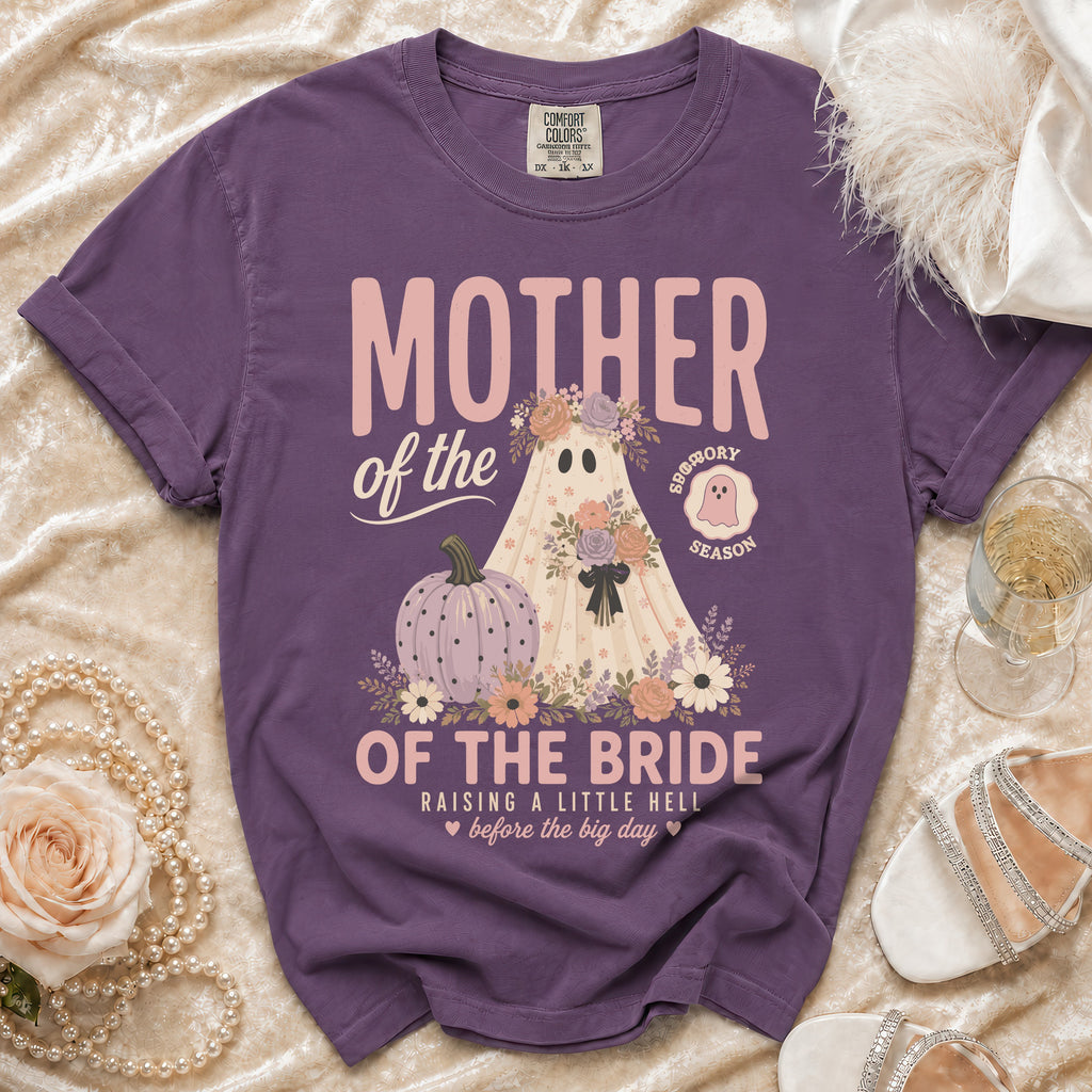 Purple t-shirt with "Mother of the Bride" graphic featuring a ghost, pumpkin, and flowers.