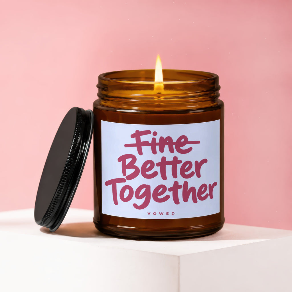 Amber jar candle with lit flame and "Fine Better Together" text.