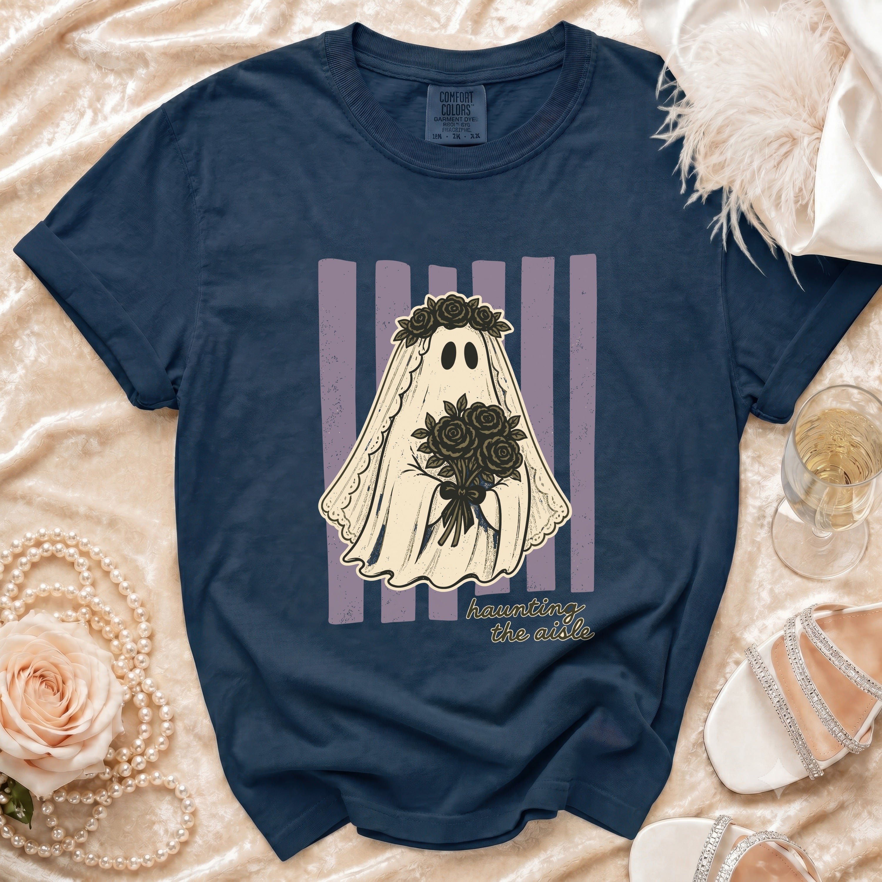 Navy t-shirt with ghost bride graphic holding roses and "haunting the aisle" text.