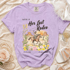 T-shirt graphic: woman on horseback, lasso, desert scene, "Her Last Rodeo," "Jennifer's Bach," "Summer 2026."