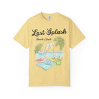 T-shirt with "Last Splash" text, beach scene, hats, swimsuits, and champagne flutes.