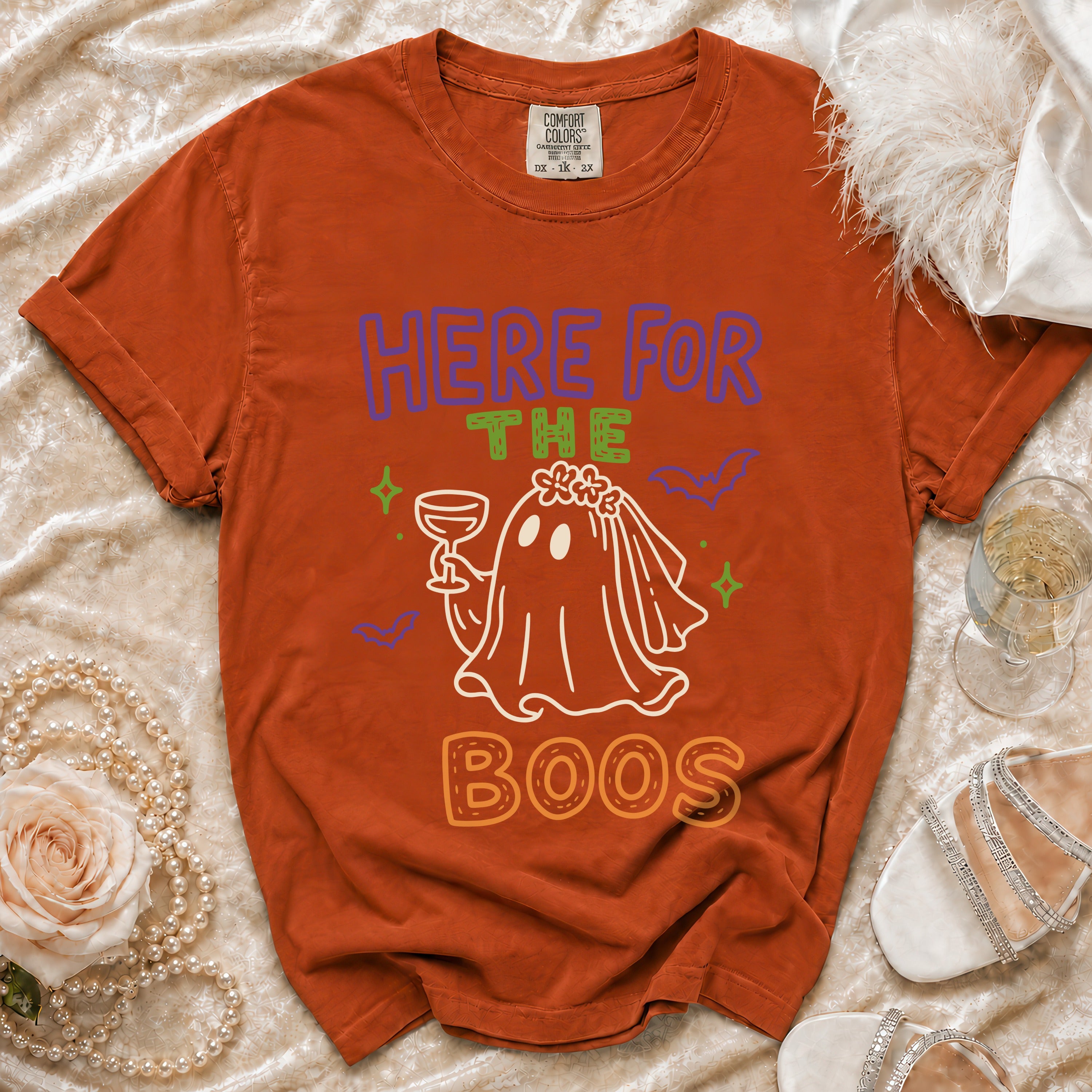 Orange t-shirt with "HERE FOR THE BOOS" text and a ghost bride graphic.