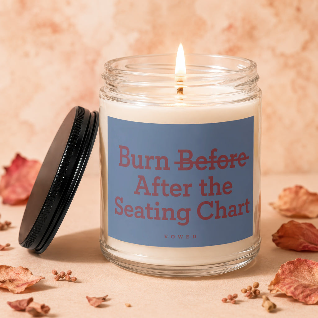 Glass jar candle with "Burn Before After the Seating Chart" text.