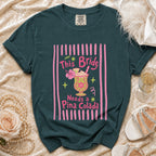 Dark green t-shirt with pink "This Bride Needs a Pina Colada" graphic.