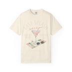 Cream t-shirt with "Last Splash Bride to Be Sarah's Bach Malibu CA Summer 2026" text, ring, sunglasses, and drink.
