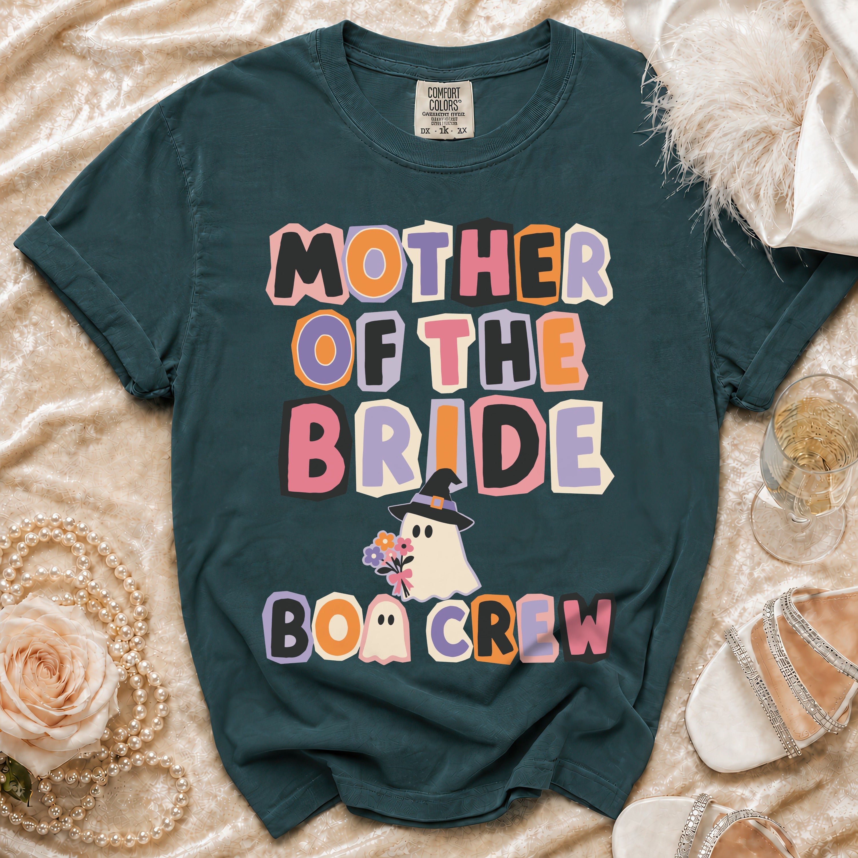Dark teal t-shirt with "Mother of the Bride Boo Crew" text and ghost graphics.