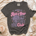 T-shirt with "Member of the Maid of Honor Club" graphic and bridal accessories.