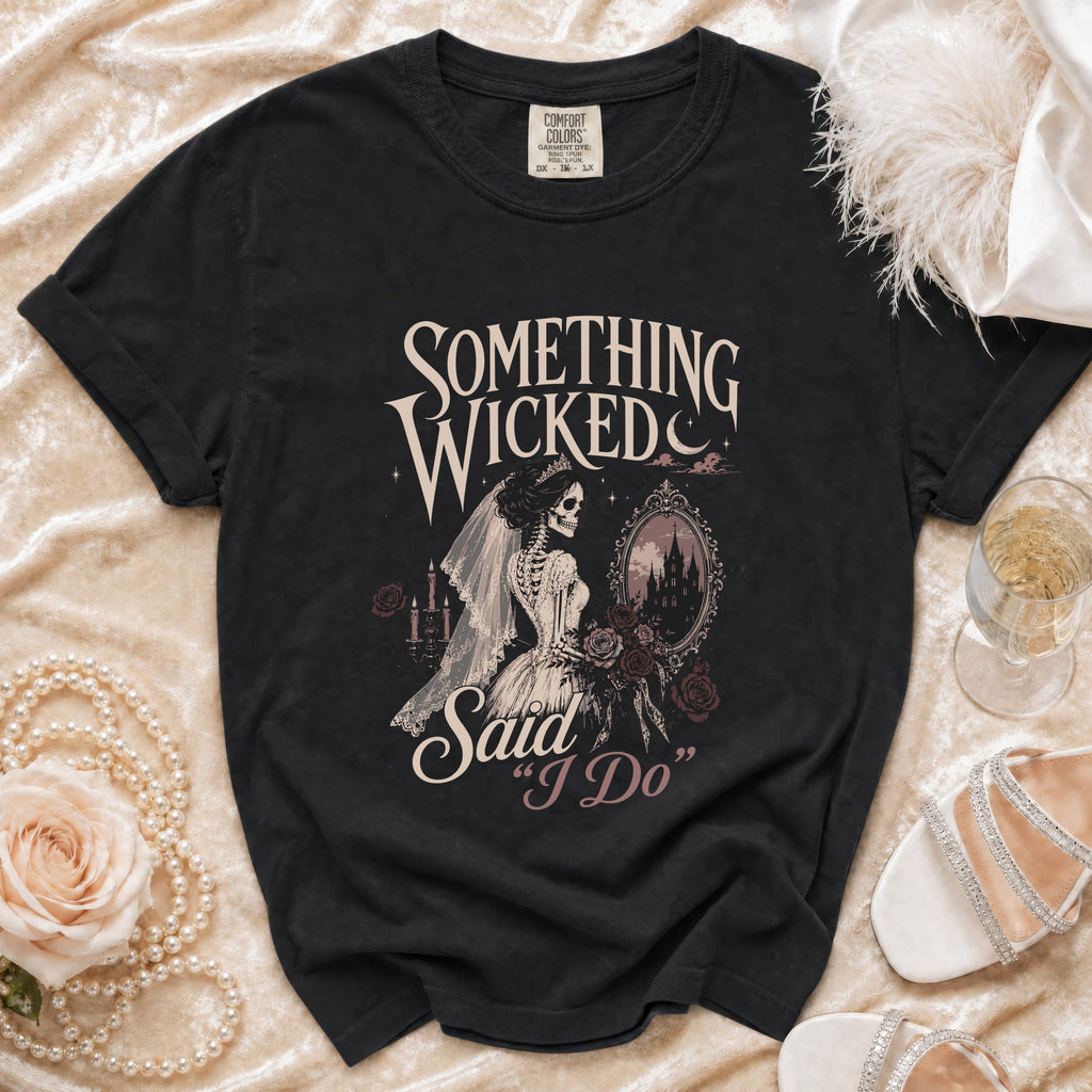 Black t-shirt with "Something Wicked Said I Do" skeleton bride graphic.