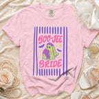 Pink t-shirt with "Boo-Jee Bride" graphic featuring a ghost bride and bats.