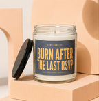 Glass jar candle with lid off, labeled "CONFIDENTIAL: BURN AFTER THE LAST RSVP".