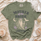 Ghost graphic t-shirt with "Mother of the Bride" text and "Raising the bride, surviving the planning" saying.