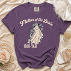 Purple t-shirt with "Mother of the Bride Boo-Yah" graphic of a ghost holding wine.