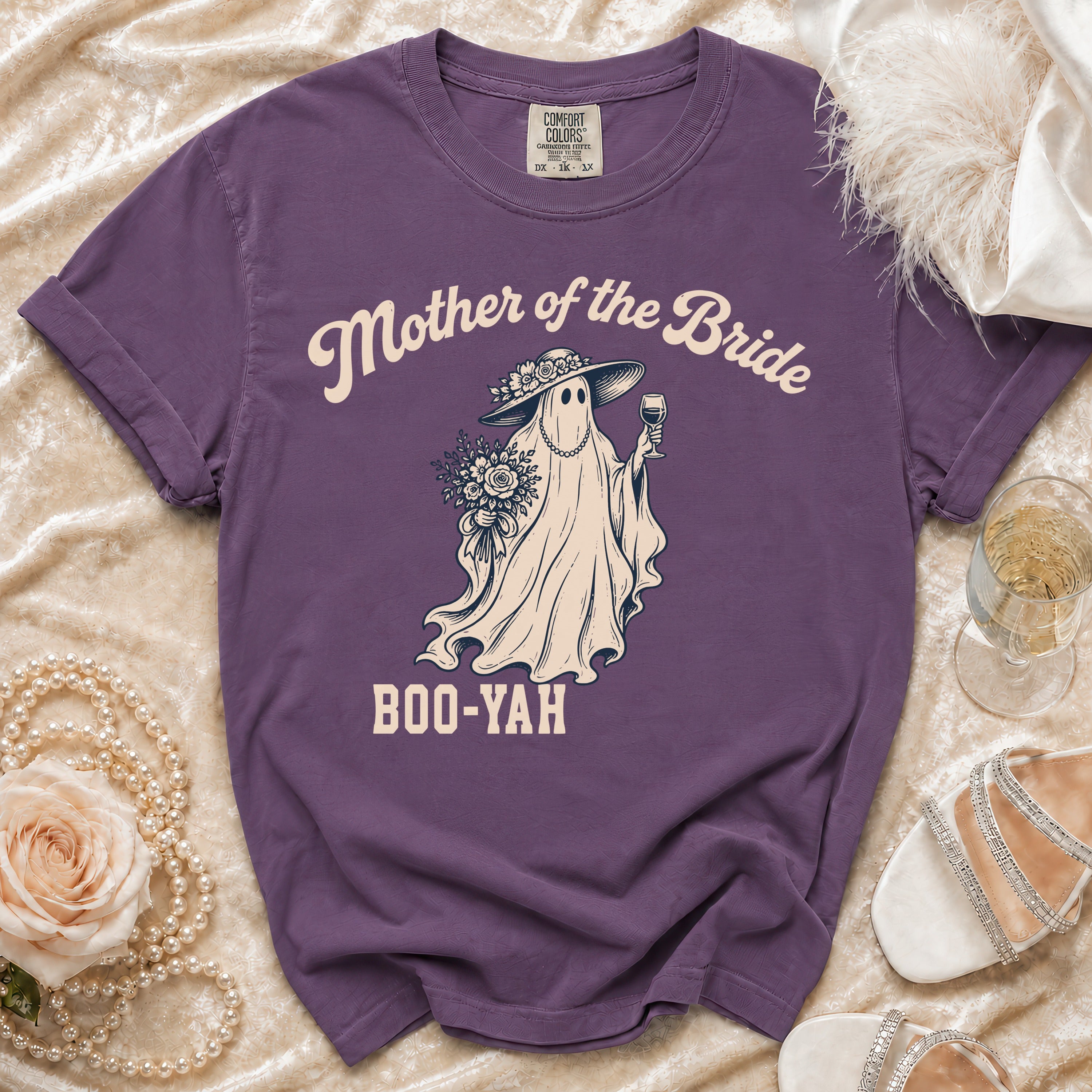 Purple t-shirt with "Mother of the Bride Boo-Yah" graphic of a ghost holding wine.