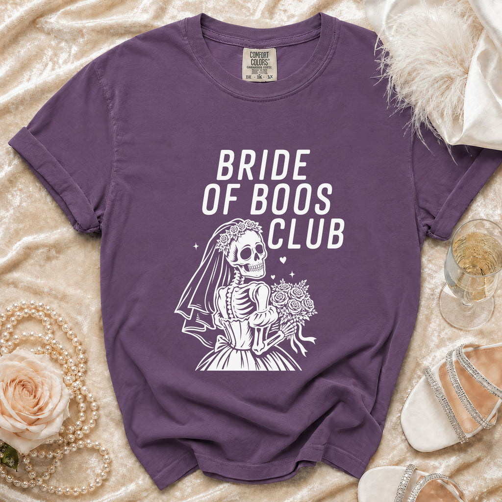 Purple t-shirt with "Bride of Boos Club" text and skeleton bride graphic.