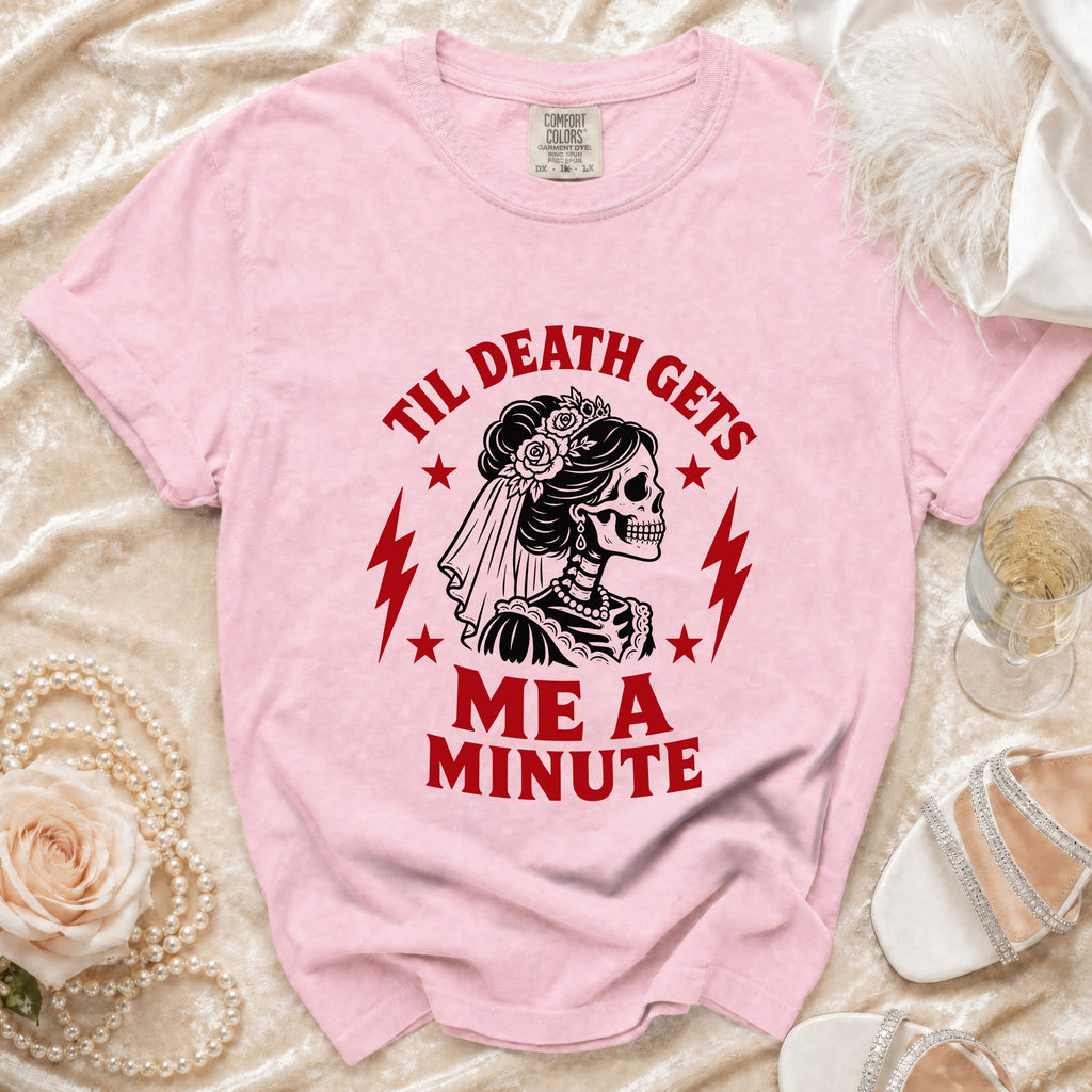 Pink t-shirt with skeleton bride graphic and text "Til Death Gets Me A Minute".